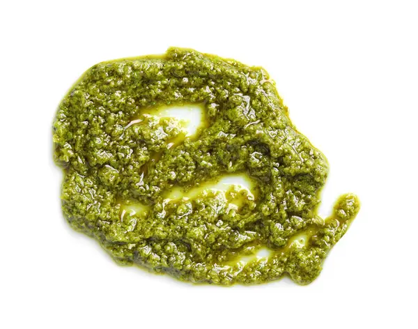 Beyaz üzerine izole edilmiş lezzetli pesto sosu örneği.