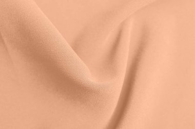 Şeftali rengi kumaş, üst görünüm. 2024 'ün moda gölgesi