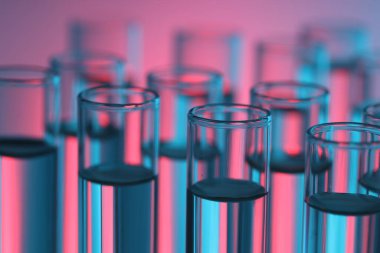 Renk arkaplanında birçok cam test tüpü, yakın plan