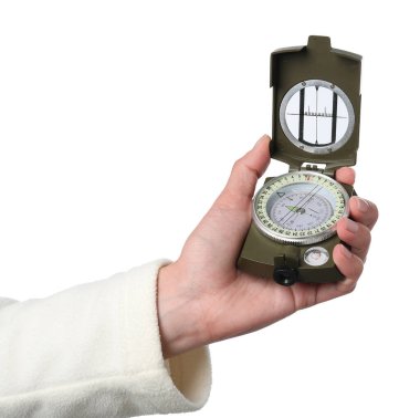 Woman holding compass on white background, closeup