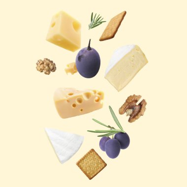 Bej arka planda farklı peynir, kraker, üzüm, biberiye ve ceviz çeşitleri