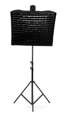 Profesyonel ışıklandırma beyazda izole edildi. Fotoğraf stüdyosu ekipmanı