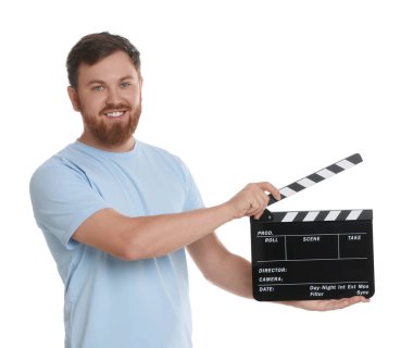 Making movie. Smiling man with clapperboard on white background