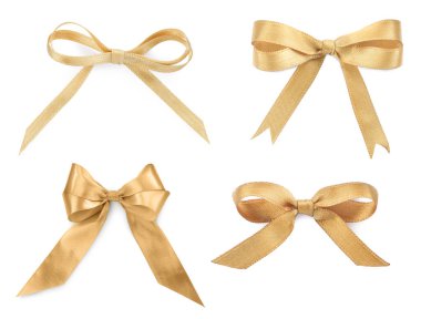 Güzel altın yaylar beyaz sette izole edilmiş.