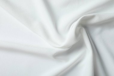 Arkaplan olarak beyaz kumaşın dokusu, üst görünüm