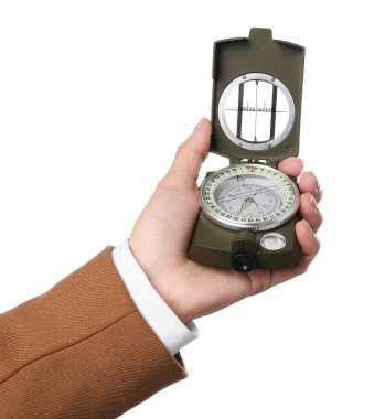 Woman holding compass on white background, closeup