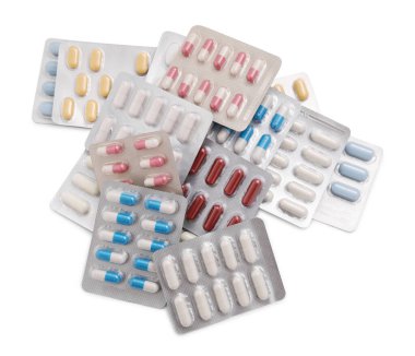 Farklı antibiyotik hapları. İzole edilmiş beyaz, üst görünüm.