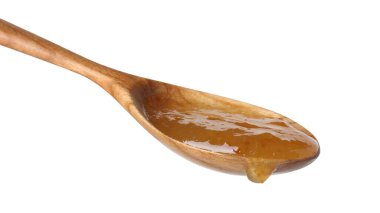 Tatlı reçelli kaşık beyaz üzerine izole