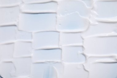 Arka plan olarak yüz kremi lekeleri, üst görünüm