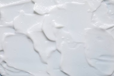 Arka plan olarak yüz kreminin dokusu, üst görünüm