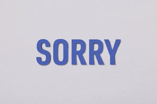 Stock image Word Sorry on white background, apology card design