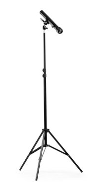 Spot ışığı beyazda izole edilmiş tripodlar. Fotoğraf stüdyosu ekipmanı