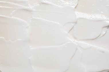 Arka plan olarak yüz kreminin dokusu, üst görünüm