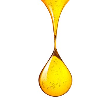 Beyaza izole edilmiş organik bal damlası