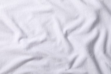 Arkaplan olarak beyaz kumaşın dokusu, üst görünüm