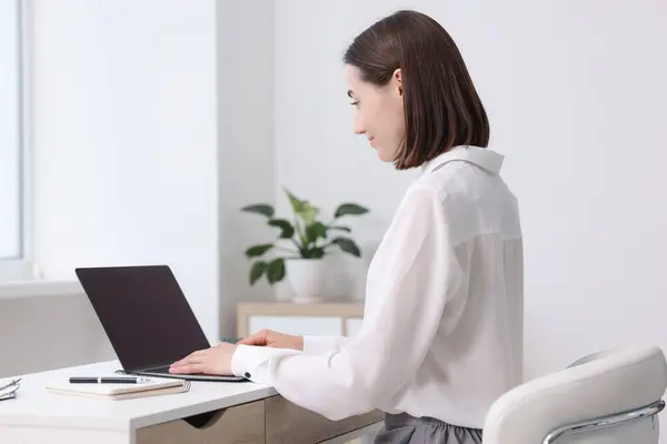 stock image Woman with good posture working in office