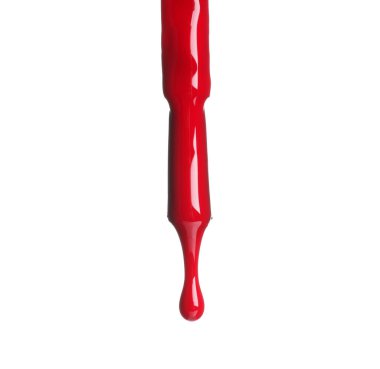 Fırçadan damlayan kırmızı oje beyaza izole edilmiş.