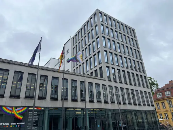 stock image Berlin, Germany - July 2, 2024: Building with flags of bright progress and Germany outdoors