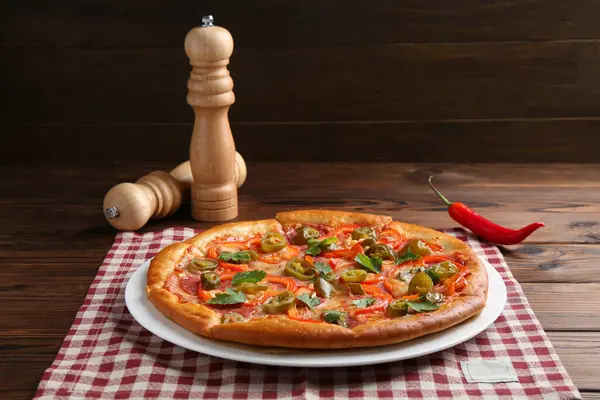 stock image Delicious hot pizza Diablo on wooden table