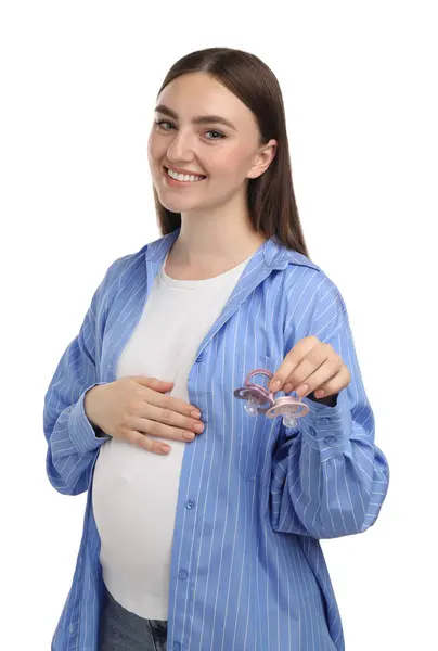 stock image Expecting twins. Pregnant woman holding two pacifiers on white background