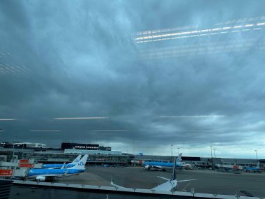 Haarlemmermeer, Netherlands - July 3, 2024: Modern airplanes in Amsterdam Airport Schiphol clipart