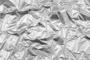 Arkaplan olarak buruşmuş gümüş folyo, üst görünüm