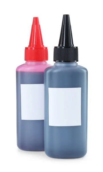 stock image Bottles of different printer ink isolated on white