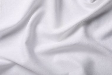 Arkaplan olarak beyaz kumaşın dokusu, üst görünüm