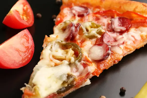 stock image Delicious pizza Diablo and tomato on plate, closeup