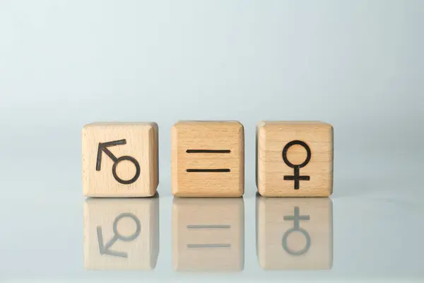 stock image Gender equality concept. Cubes with male and female symbols on light background