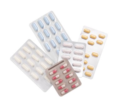 Farklı antibiyotik hapları. İzole edilmiş beyaz, üst görünüm.