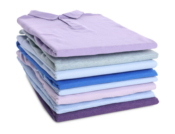 Stack of clean colorful t-shirts isolated on white