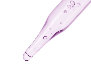 Beyaz arka planda pembe kozmetik yağlı damlatıcı