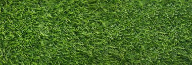 Arkaplan olarak yeşil yapay çimen, pankart tasarımı