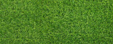 Arkaplan olarak yeşil yapay çimen, pankart tasarımı