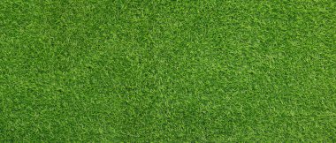 Arkaplan olarak yeşil yapay çimen, pankart tasarımı