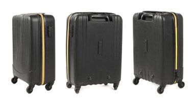 Beyaz arka planda siyah bavul seti, farklı taraflardan görünüm