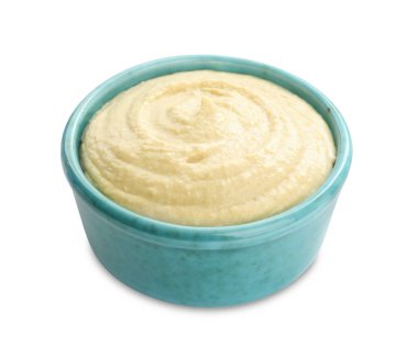 Beyaz kasedeki leziz humus.