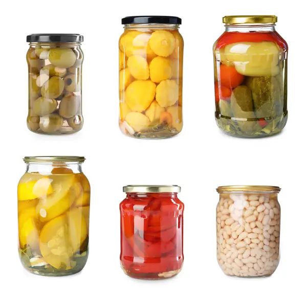 stock image Glass jars with different pickled foods on white background, set