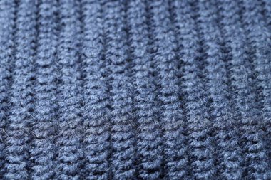Arka plan olarak mavi örülmüş kumaş dokusu, yakın plan