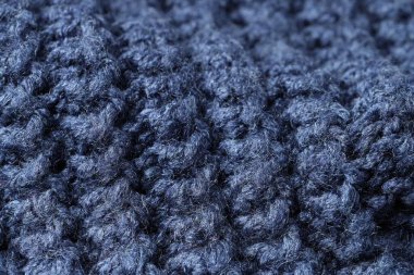 Arka plan olarak mavi örülmüş kumaş dokusu, yakın plan