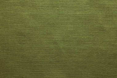 Arkaplan olarak adaçayı rengi çuval bezi kumaşı, üst görünüm