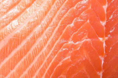 Arka plan olarak taze somon, yakın plan. Deniz yiyeceği