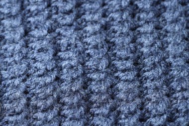 Arka plan olarak mavi örülmüş kumaş dokusu, yakın plan