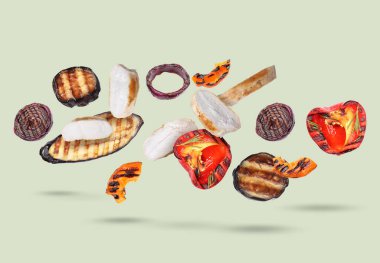 Izgara sebzeler ve arka plana düşen tavuklar