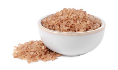 Raw organic matta rice in bowl isolated on white clipart