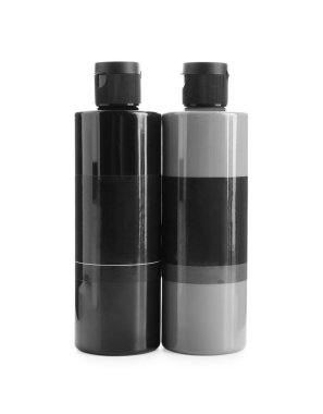 Beyaz şişelerde farklı renkte akrilik boyalar.