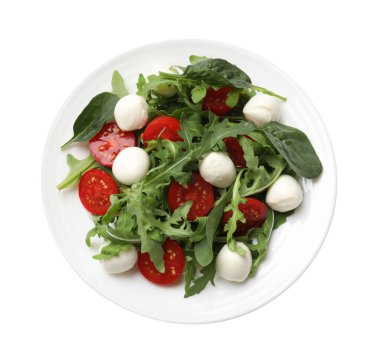 Arugula, ıspanak, mozzarella peyniri ve beyaz domatesli lezzetli salata.
