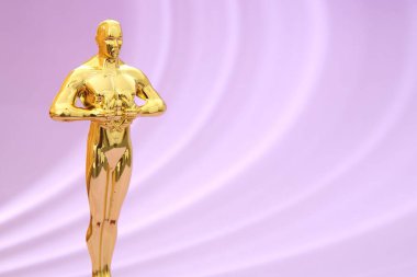 Menekşe arkaplan üzerine bir altın Oscar ödülü, metin için boşluk
