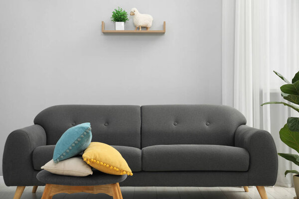 Comfortable couch in living room. Interior design